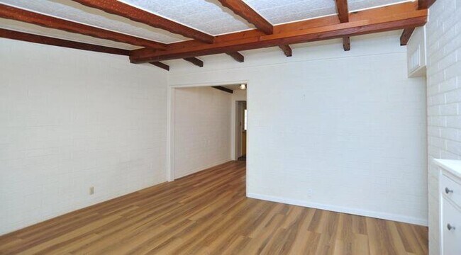 Building Photo - 3 BR/1.5 BA with large yard, new kitchen &...