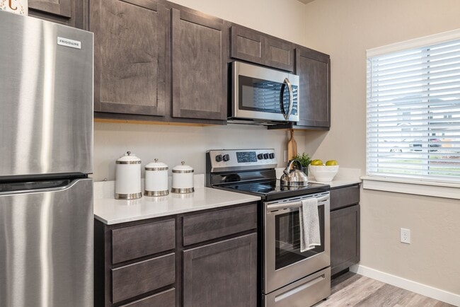 Building Photo - Wilson Creek Townhomes - $500 off with 6-months of free covered parking for move-ins by the end o...