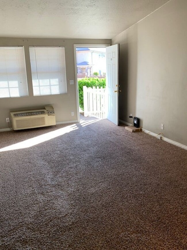 Building Photo - SpringTree Gardens Condominium