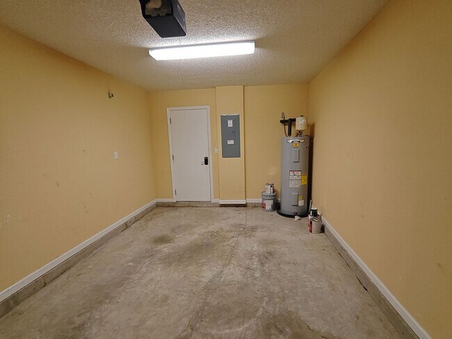 Building Photo - Spacious 2-Bed, 2.5-Bath Townhome with Gar...