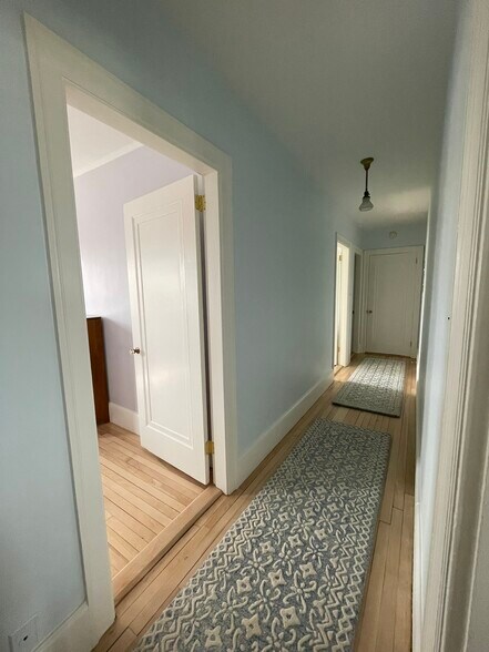 Hallway, with master bedroom door to the left - 11 Ricker Park