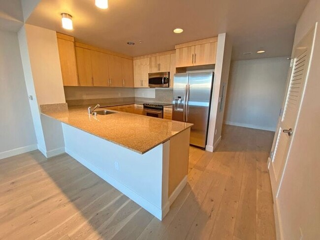 Building Photo - Live at The Axis High-Rise! Upscale, Urban...