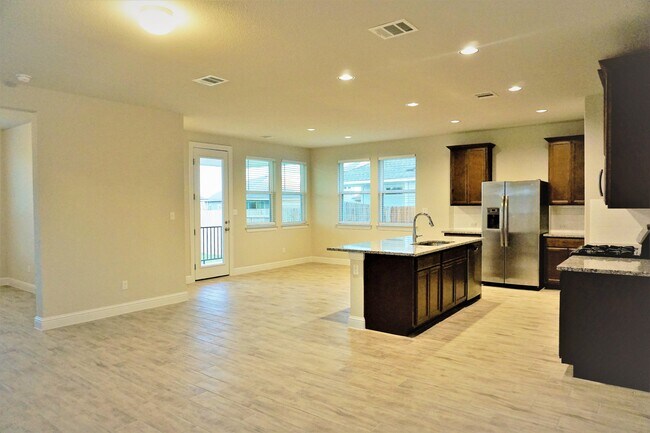 Open floor plan with lots of natural light, custom blinds throughout entire home - 260 Gaida Loop