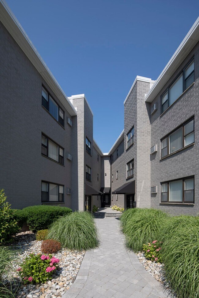 Building Photo - Villa Malta: On-Site Washer & Dryer, Water Included, Cat Friendly, and Walk-In Closets