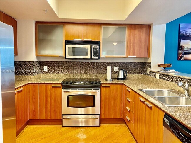 Building Photo - 16699 Collins Ave