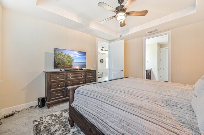 Building Photo - **Coach Home w/ Private Pool in Esplanade Lake Club **