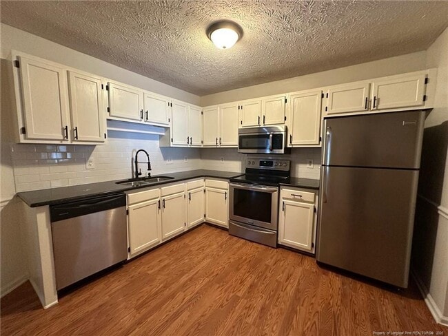 Building Photo - 2229 Mossycup Ln