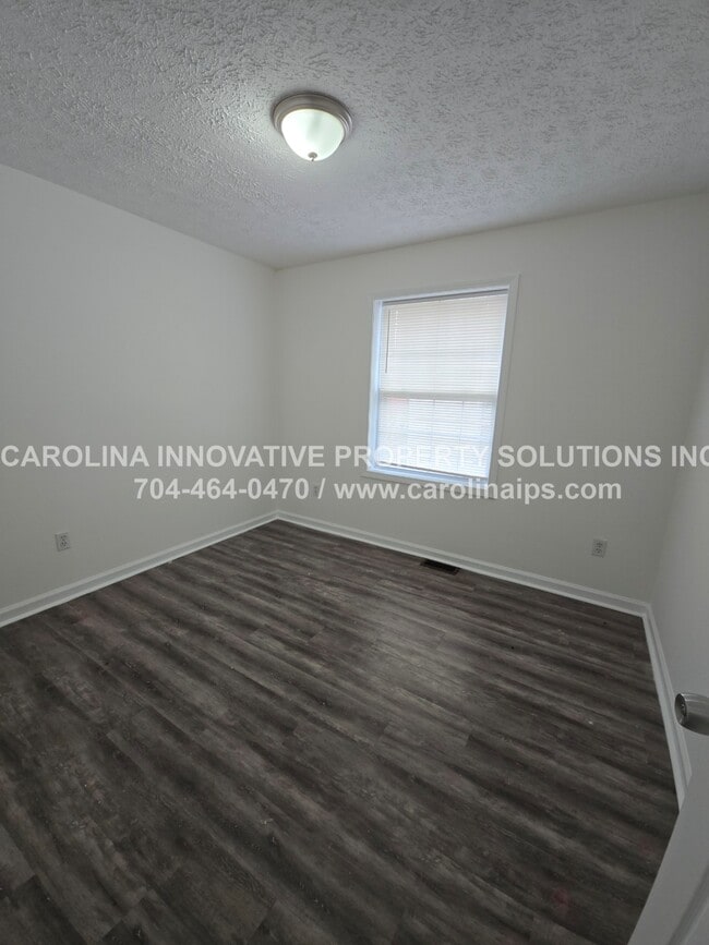 Building Photo - 1409 Tinnin Ave