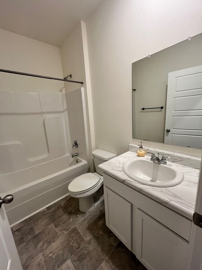Building Photo - HALF-PRICE RENT for Your First Month: Move...