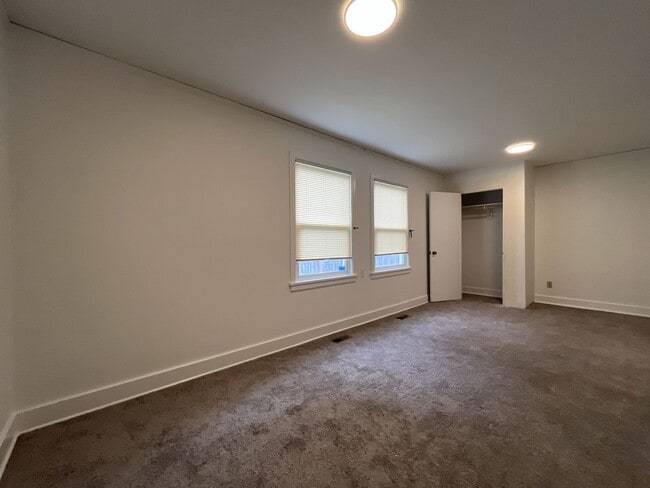Building Photo - Expansive 4BR 2,900+ Sq Ft Home with Theater-Style Living Room & Bonus Hobby Workshop