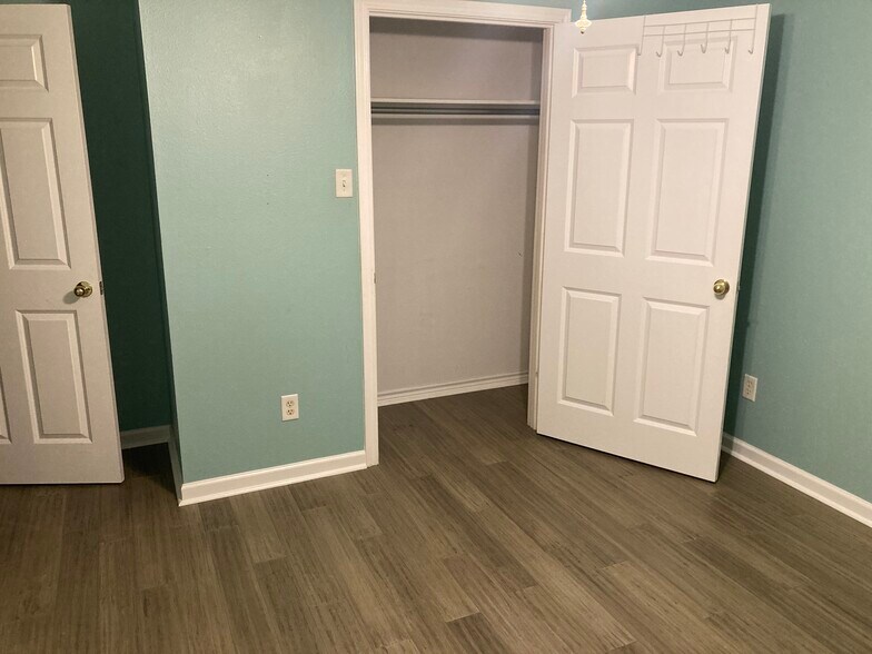Bedrooms with ample closet space. - 16485 County Road 164