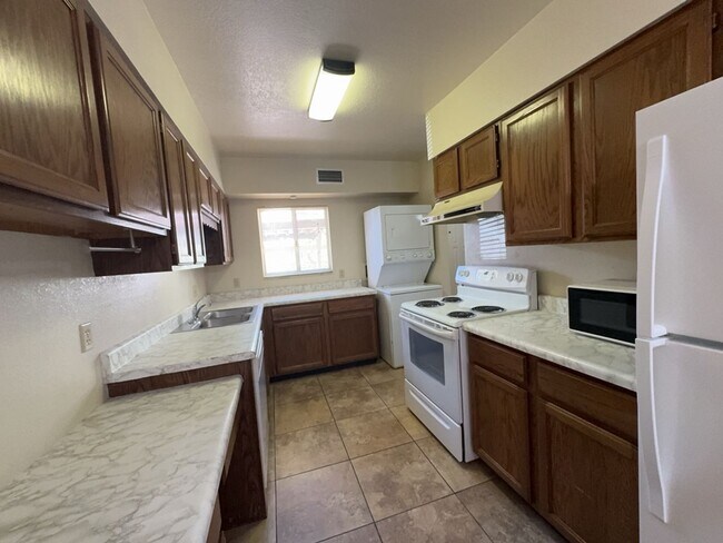 Building Photo - Spacious condo! Includes washer & dryer & ...
