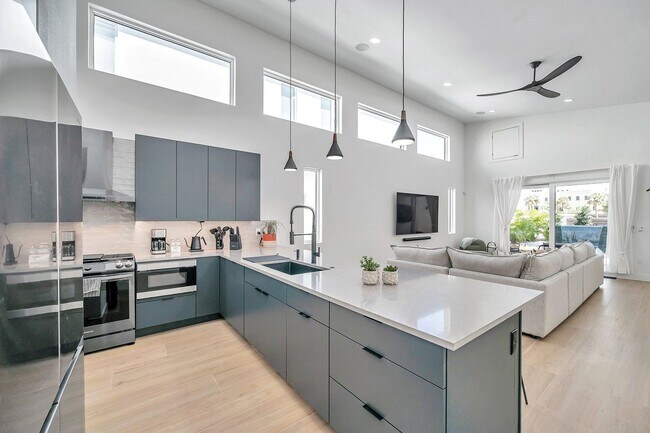 Building Photo - Luxury Living in Grand Central District: Exquisite Furnished Home with Pool