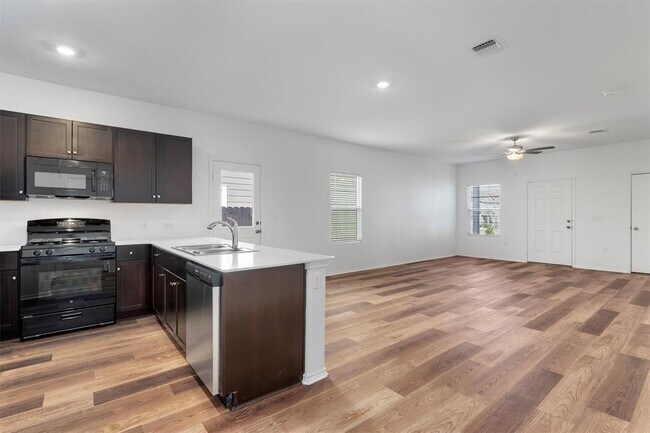 Building Photo - 7704 Poppy Petal Dr