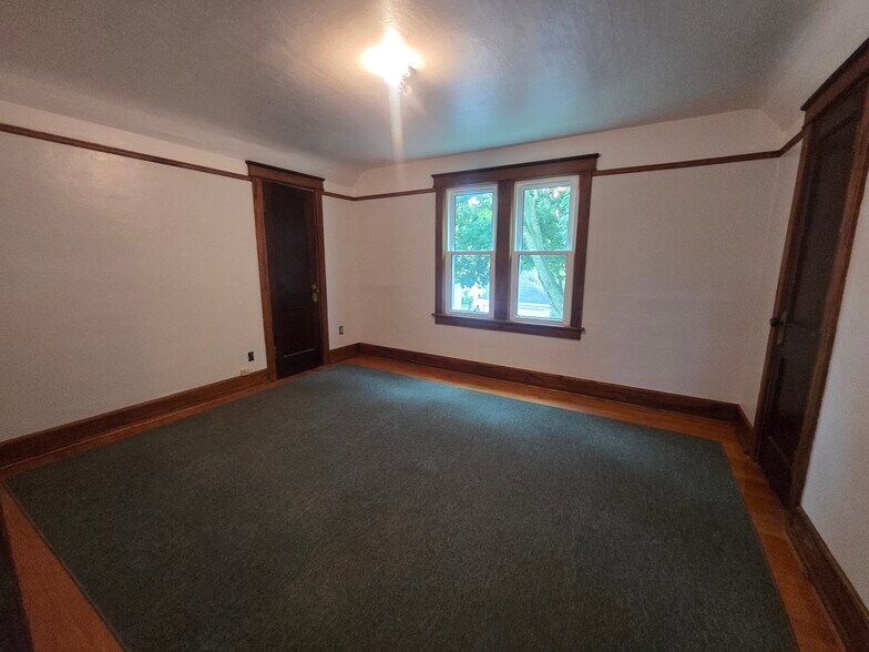 Upstairs bedroom #1 with two closets - 2412 E Ohio Ave