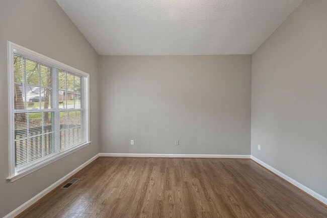 Building Photo - Like New Home off Freeman Mill. Just Painted, New Wood/Vinyl Flooring, Vaulted Ceilings, Front Po...