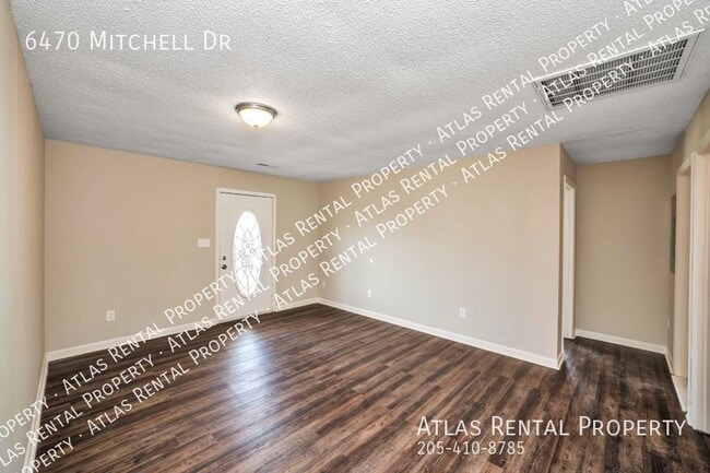 Building Photo - 6470 Mitchell Dr