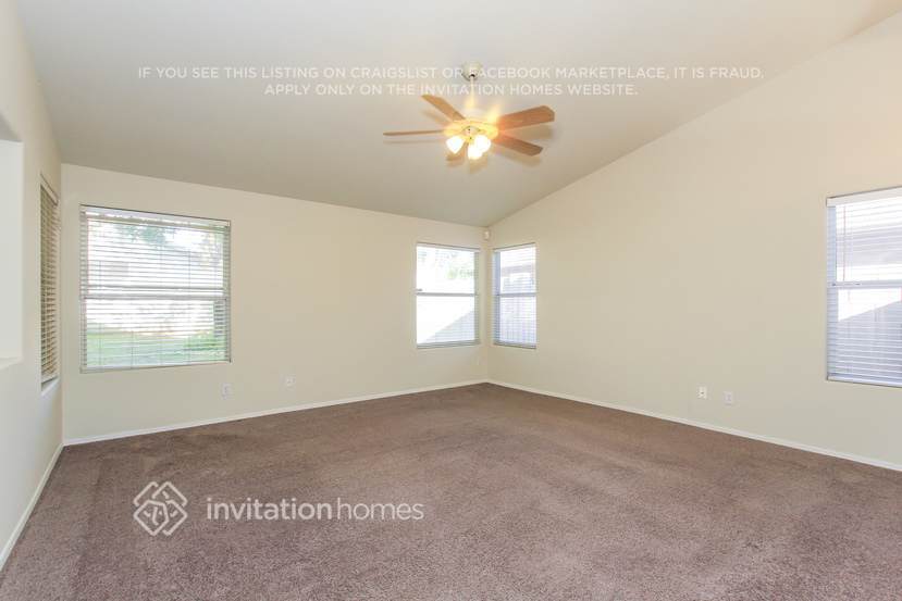 Building Photo - 8228 W Harmony Ln