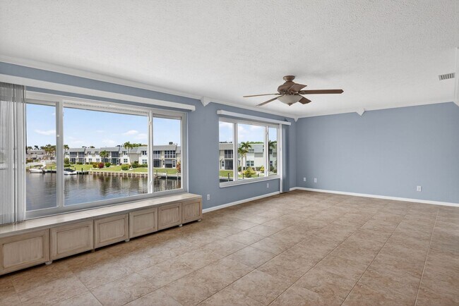 Building Photo - Gulf Access 2 bedroom 2 Bath Fully updated Condo with Water View