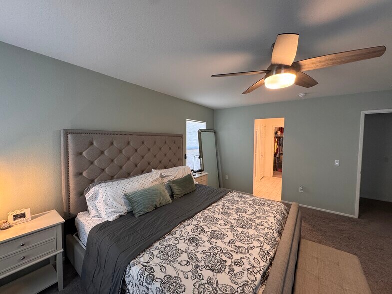 master bedroom view into bathroom - 15659 Whispering Creek Way