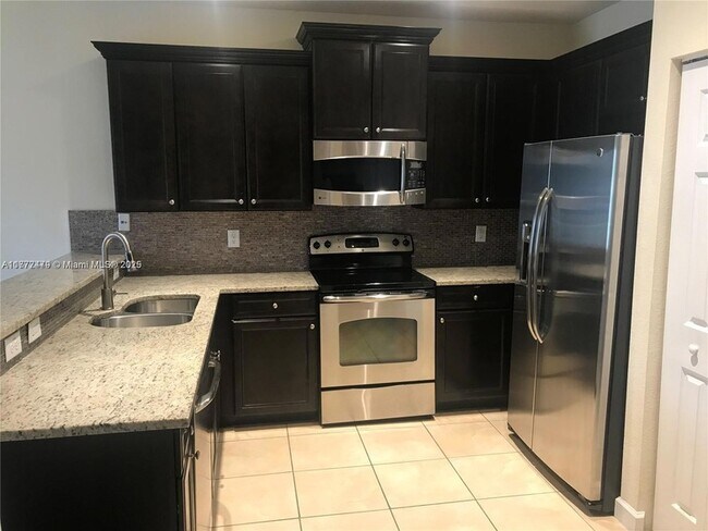 Building Photo - 8965 NW 98th Ave