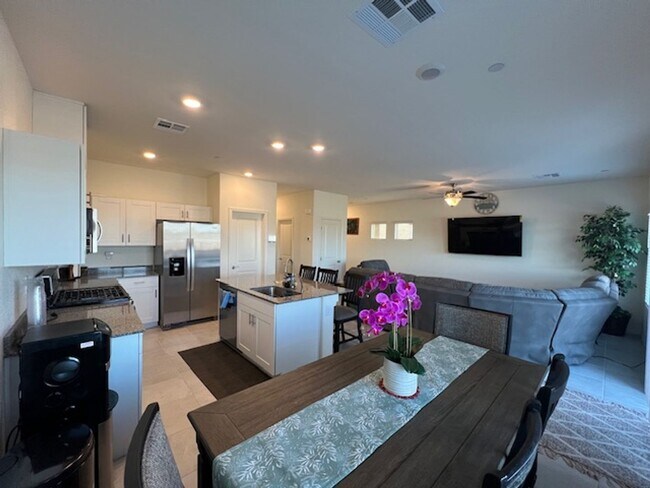 Building Photo - FULLY FURNISHED!!! beautiful 3 bedroom 2 and half bath home is located in the Symmetry Bay Cadenc...