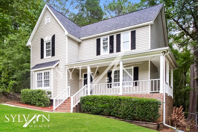 Building Photo - Enjoy the coziness of this darling home