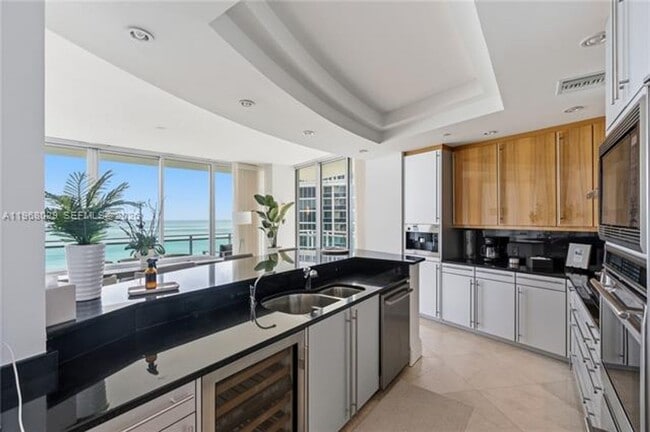 Building Photo - 10295 Collins Ave