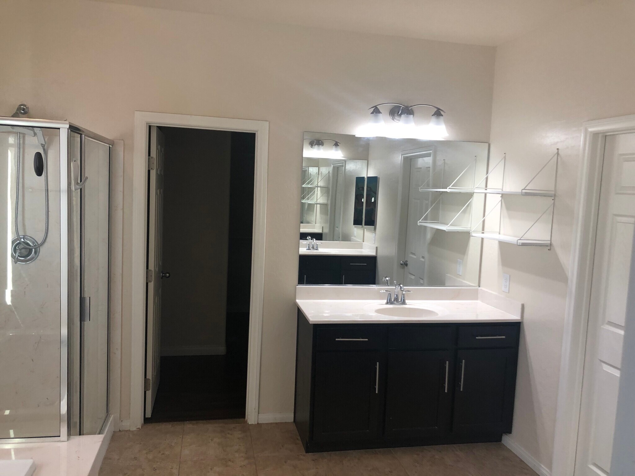 Master bedroom bath with two split faucet. Note that you have the toilet separate full privacy, the door leads to a walk-in closet - 263 Garden Trellis Ct