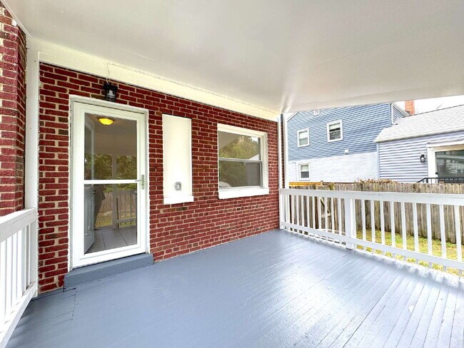 Building Photo - Charming 2BR Townhome with Finished Basement, Fenced Yard & Private Driveway Near Huntington Metro