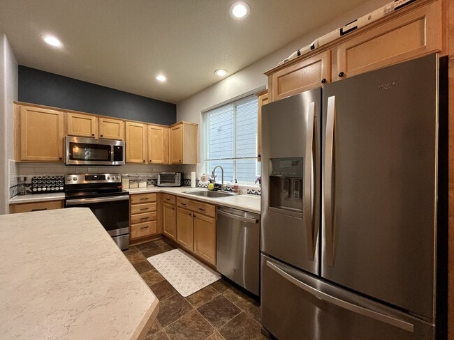 Building Photo - Modern 2 Bedroom + Bonus Room Townhome Near Nike with Dual En Suites, Balcony & Attached Garage