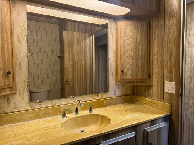Building Photo - Large Customized 2 Bedroom Manuf Home w/Bonus Room= 3 total bedrooms