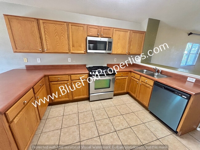 Building Photo - 9495 N Winter Wren Ave