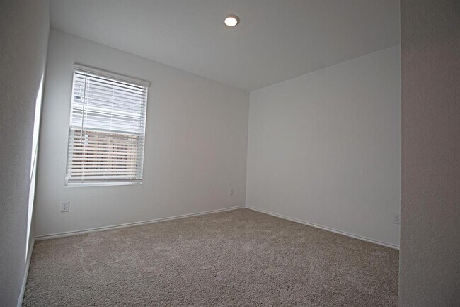 Building Photo - 5701 Manarchos Ln