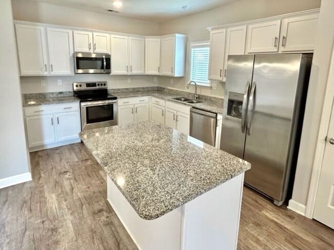 Building Photo - Now Leasing a 4-Bedroom 2.5 Bath Home in M...