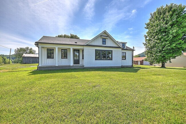 Building Photo - Updated and restored Original Farm House Style