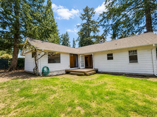 Building Photo - Sunlit Park-Like 1937 Shoreline Charmer in Lush Garden Oasis