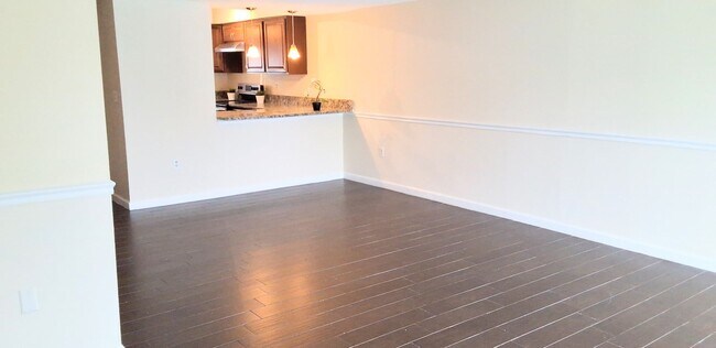 Building Photo - Stunning all remodeled 2/1.5 condo with Am...