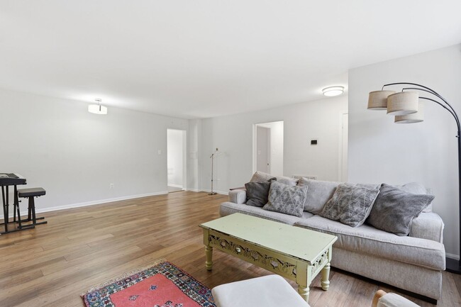 Building Photo - This beautifully refreshed condominium offers a refined blend of style and comfort