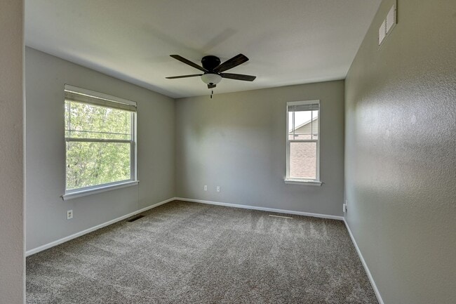 Building Photo - 5 bedroom, 4 bath home with 2 car attached garage