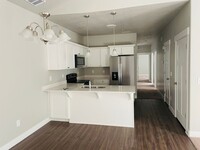 Building Photo - New Construction Condominium in Prime Rive...