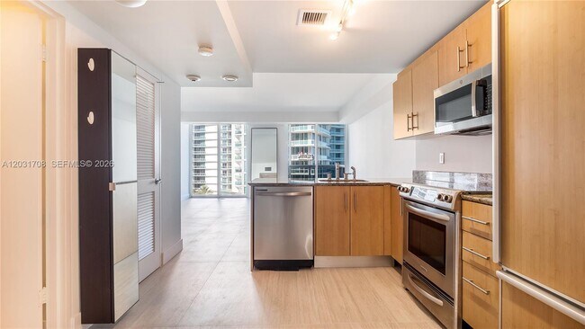 Building Photo - 10275 Collins Ave