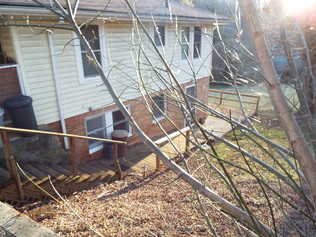 Building Photo - 2 Bedroom 1 Bath Basement Apartment in Historic Downtown Sylva $1300 a month with year-long lease.