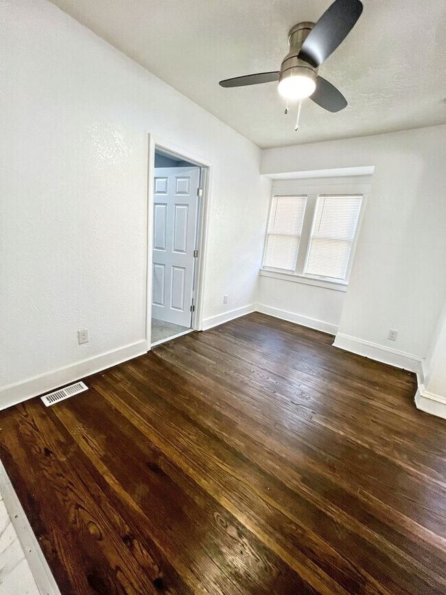 Building Photo - Spacious & Charming 5-Bedroom Home with Mo...