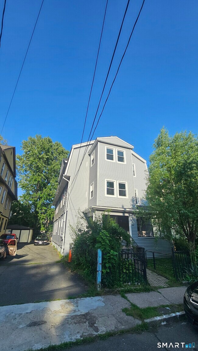 Building Photo - 142-144-144 Adams St