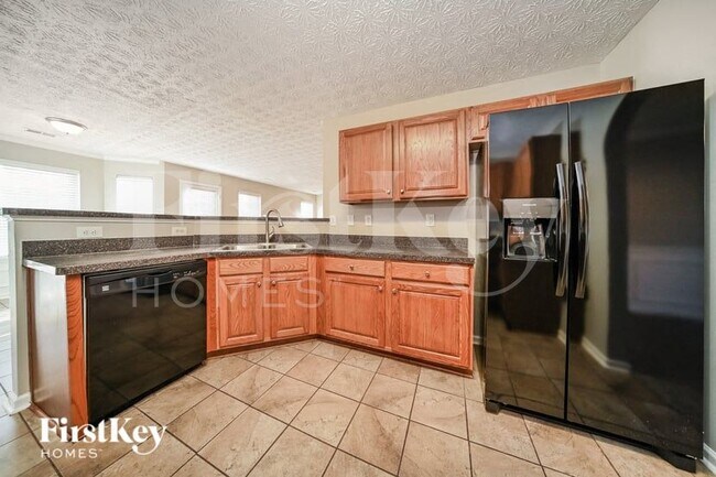 Building Photo - 6496 Snowden Dr