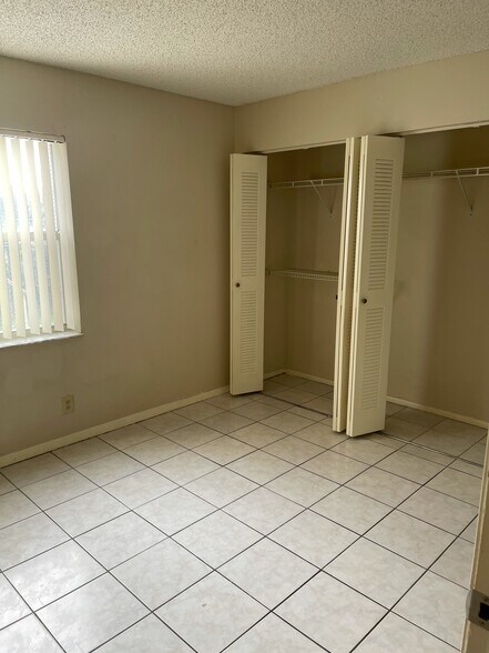 Building Photo - 10802 Royal Palm Blvd