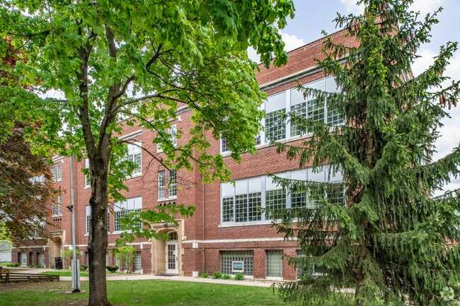 Building Photo - Elementary School Apartments
