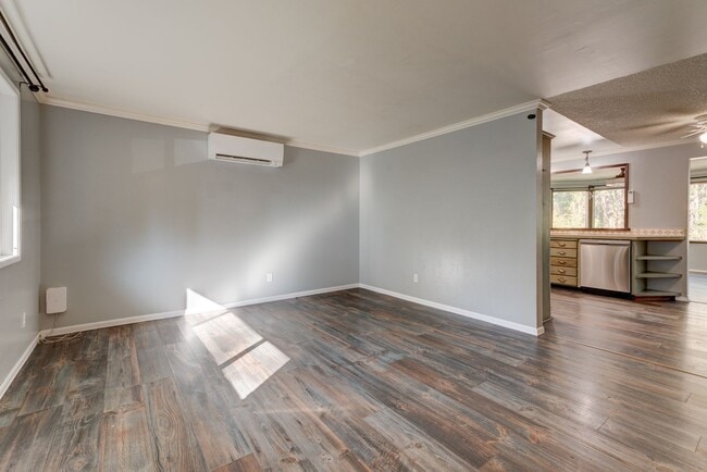 Building Photo - Spacious 4-Bedroom Home with Fireplace, Fenced Yard, and 2-Car Garage