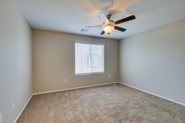 Building Photo - Spacious Townhouse with Loft & Rare 3-Car Garage!
